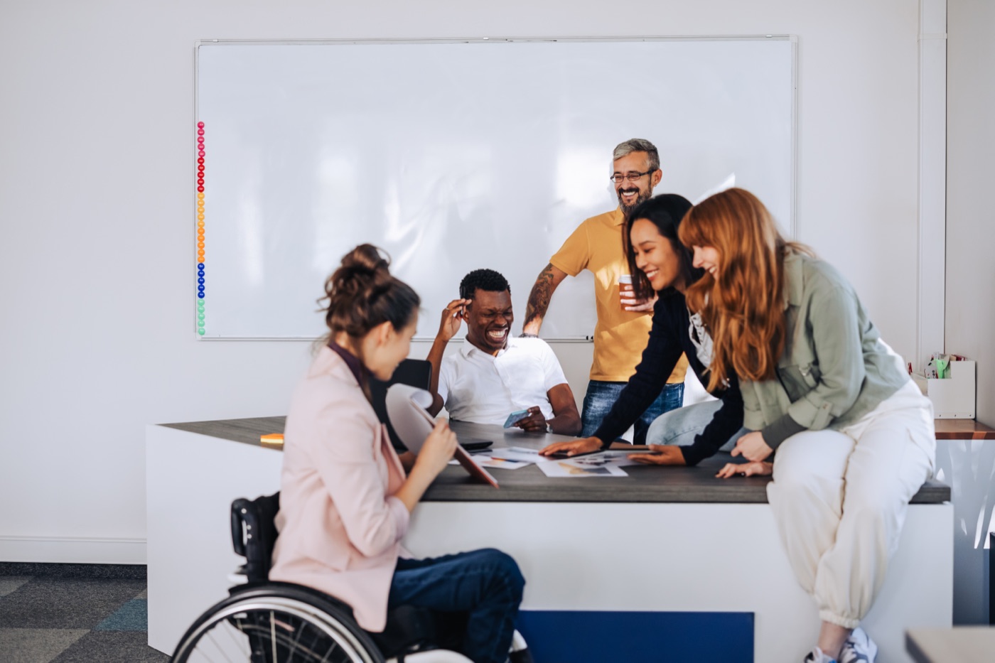 Diverse team gathered at a conference table