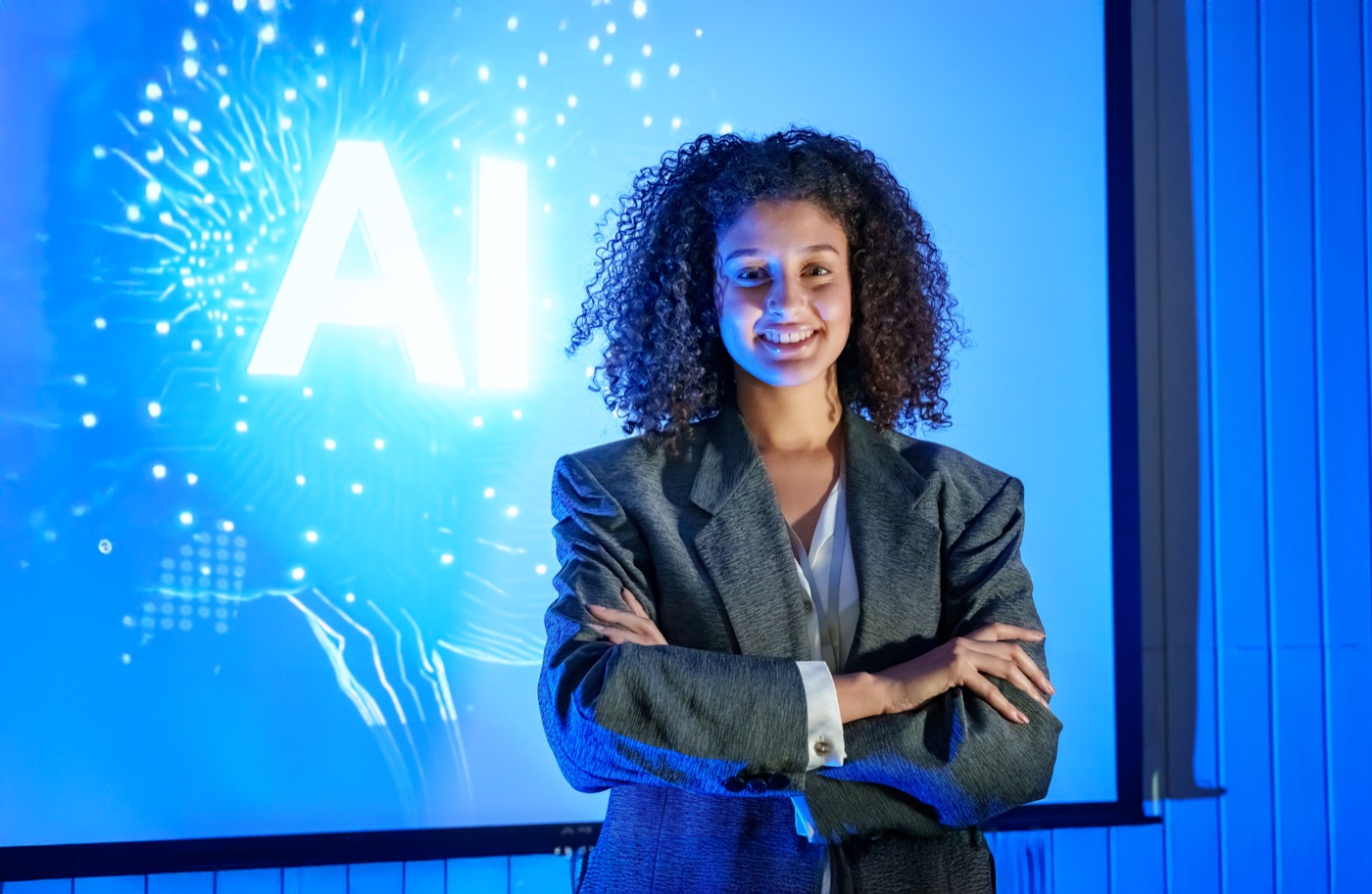 Professional woman in front of an AI display interface