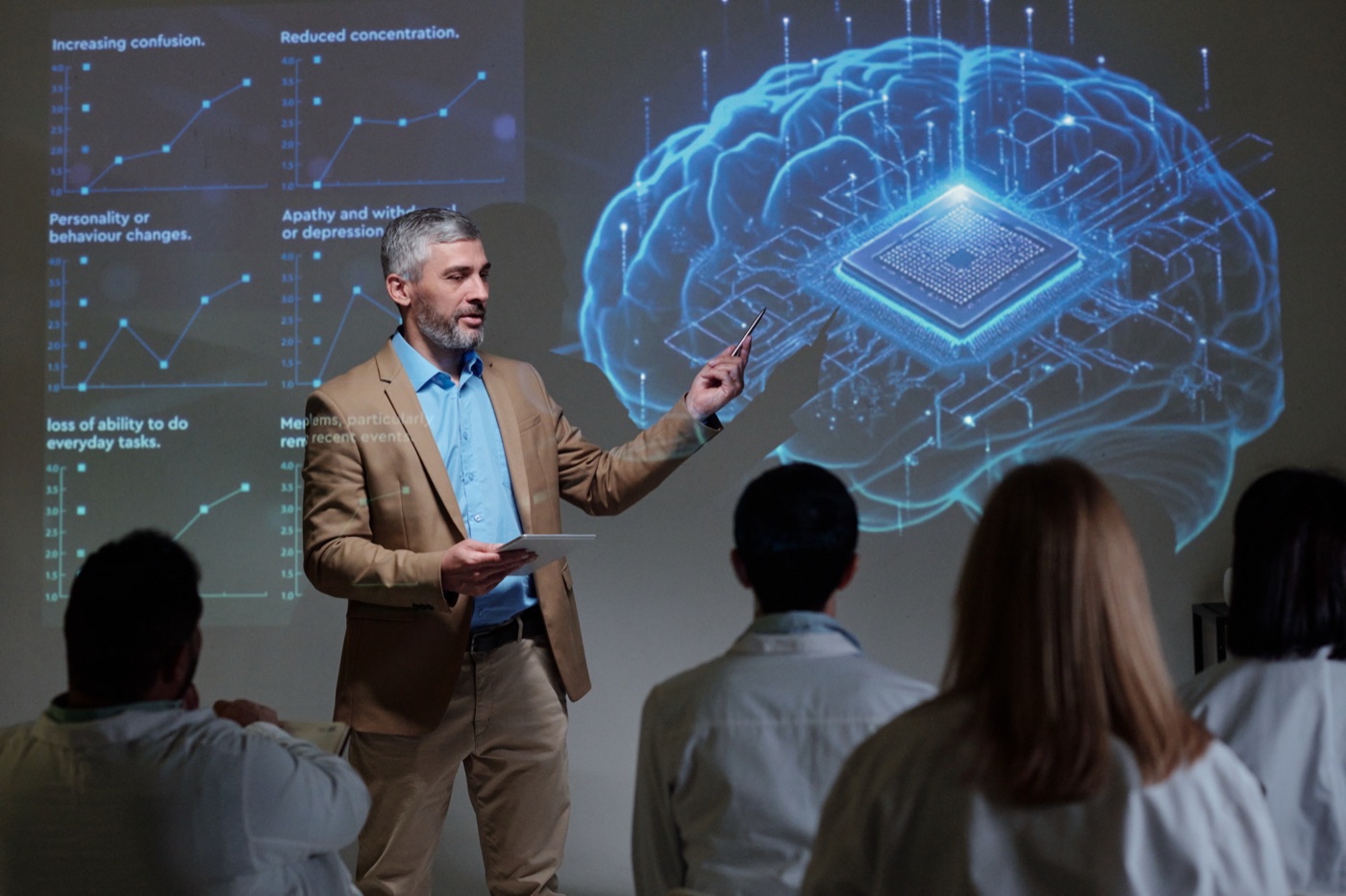 Professor explaining technology interface to students